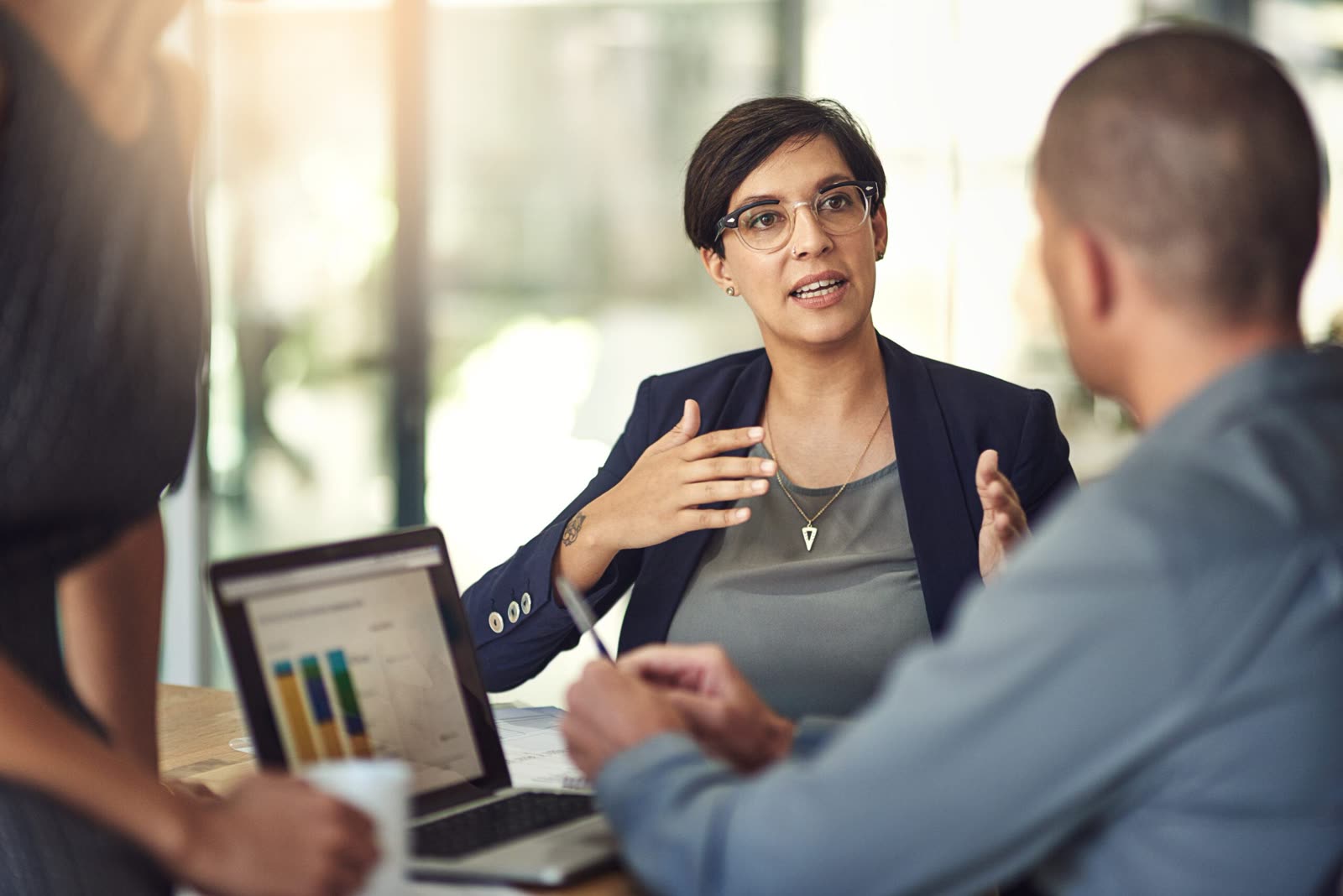 Two colleagues discussing trial data